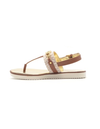 Michael Kors model Brandy Roxanne flip flops with metal accessory