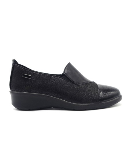 Mocasín tipo zapatilla Cinzia Soft, cómodo y con tacón de cuña.